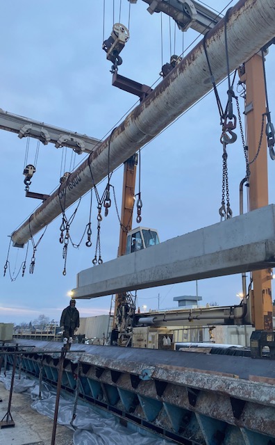 Precast concrete beam being moved at Nitterhouse Concrete's warehouse.