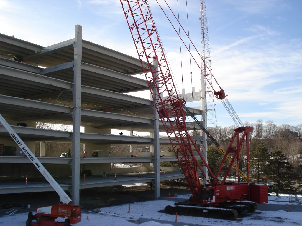 Precast concrete double tee being installed at Montclair State University's parking garage.