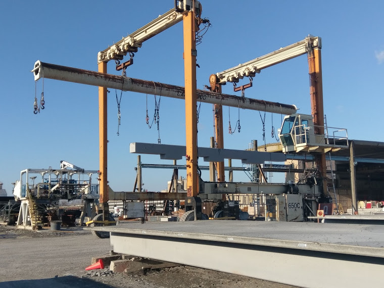 Precast concrete column being moved at Nitterhouse's warehouse.