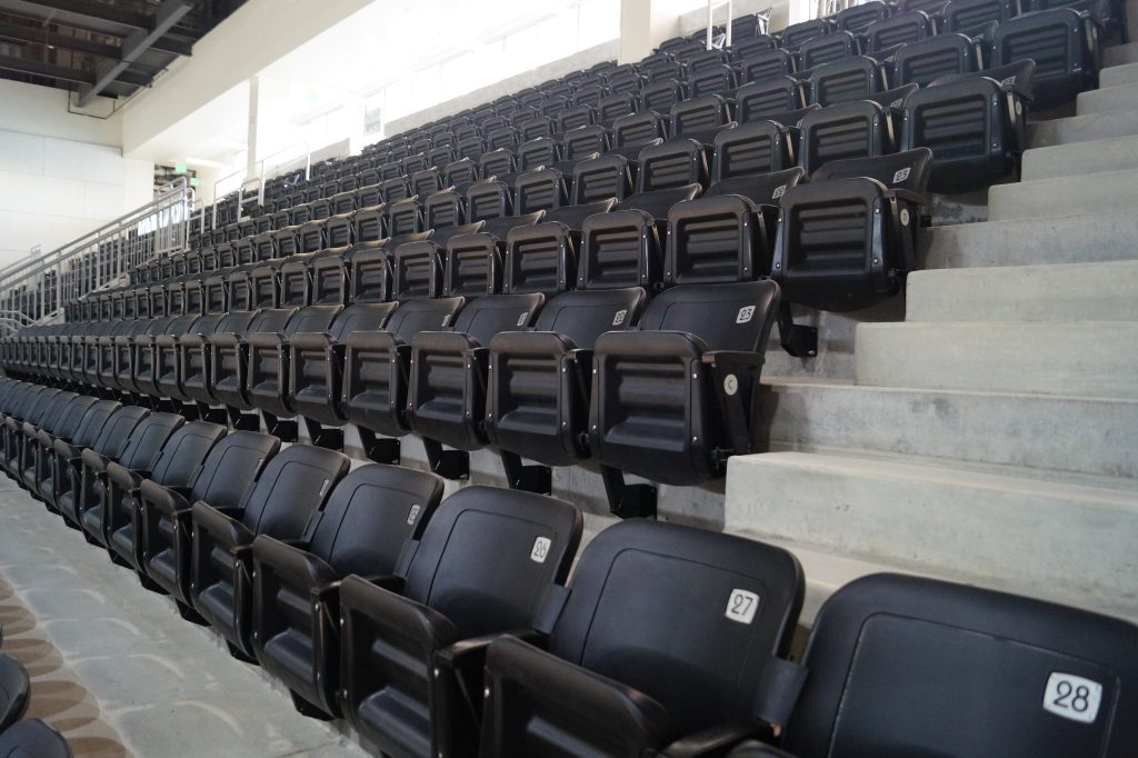 Concrete stadium risers with seating installed at UMBC's stadium.